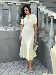 Vestido midi de punto plisado con mangas acampanadas Daniela