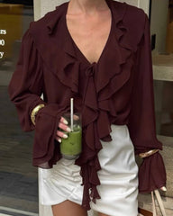 Blusa Kelly con fiocco e balze